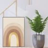 Decorative plant in a pot on a windowsill with a neutral-colored wall in the background