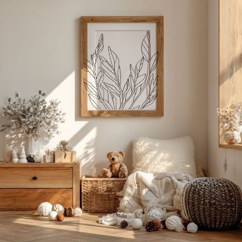 Nursery room with wooden dresser, teddy bear, and framed artwork on the wall.