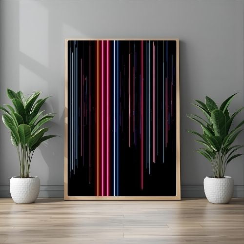 Framed abstract artwork with colorful vertical lines on a gray wall with two potted plants.