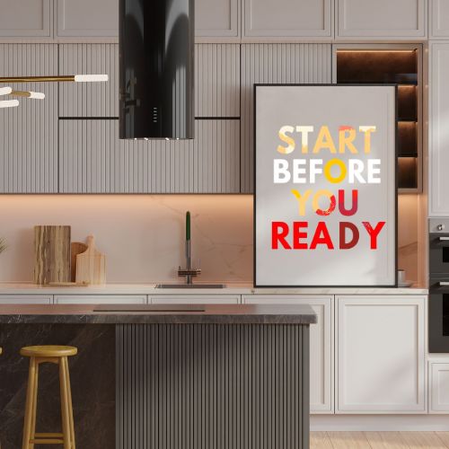 Modern kitchen with a motivational poster on the wall