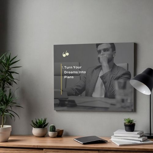 Decorative wall art with motivational quote in a home office setting