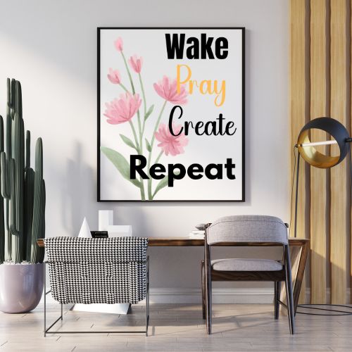Decorative wall art with motivational quote in a modern office setting